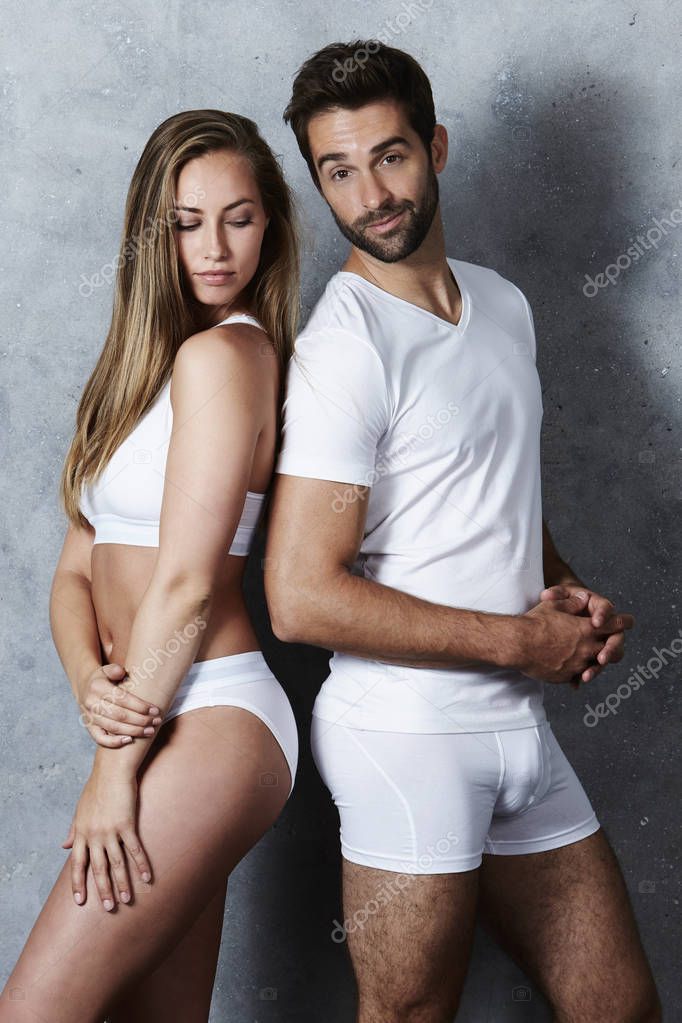 https://st3.depositphotos.com/4071389/12884/i/950/depositphotos_128847936-stock-photo-beautiful-couple-in-white-underwear.jpg