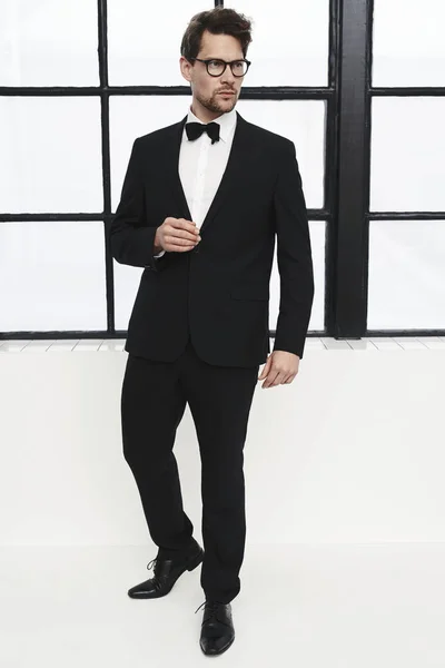 Handsome man in black tuxedo — Stock Photo, Image