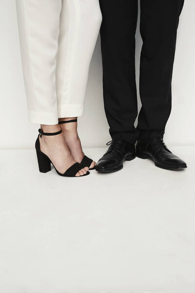 Fashionable shoes on couple