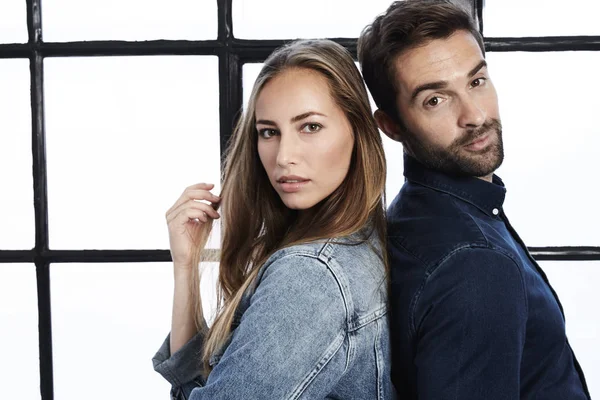 Beautiful couple wearing denim clothes — Stock Photo, Image