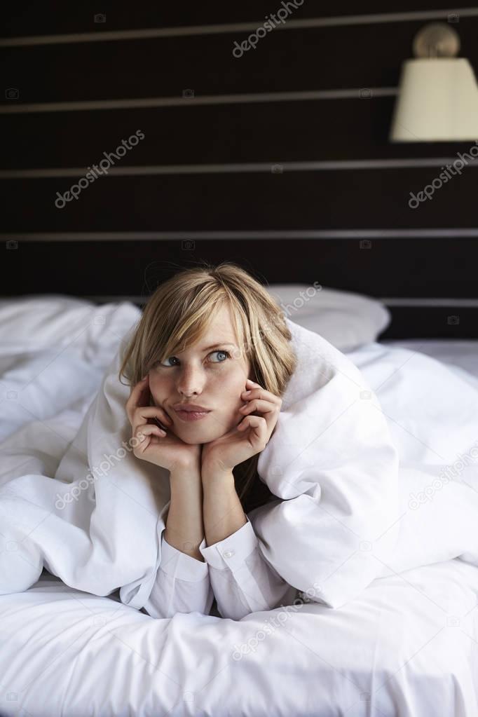 Beautiful woman in bed