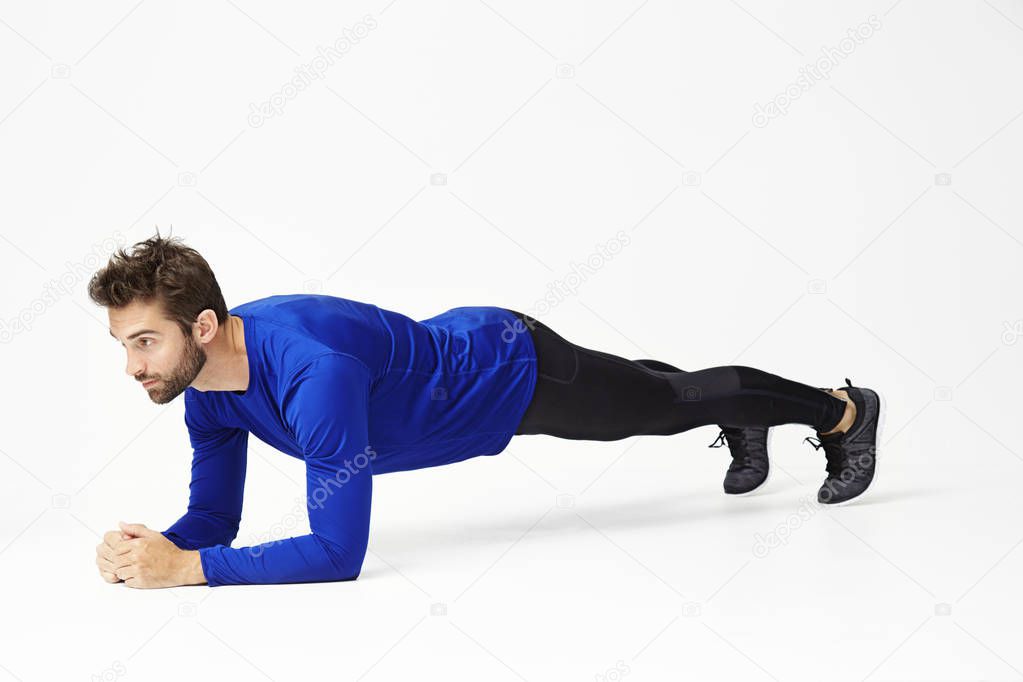 Athlete doing plank exercise