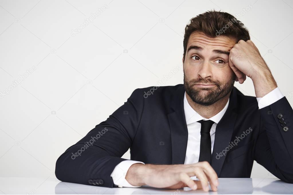 Bored businessman in suit