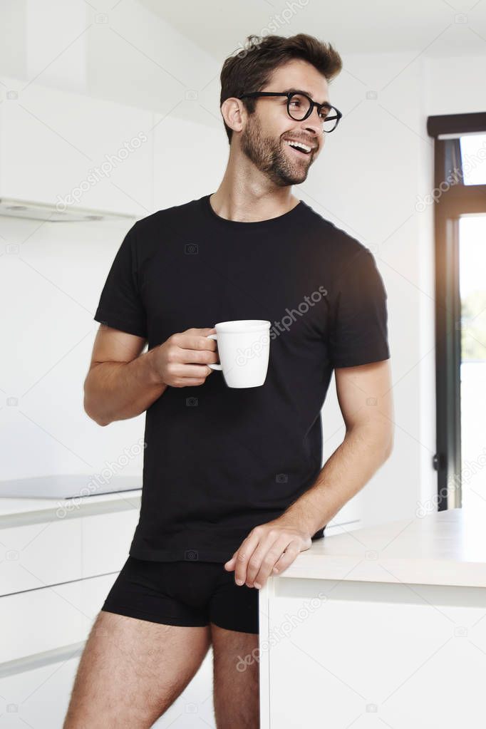 Bearded man with coffee cup  