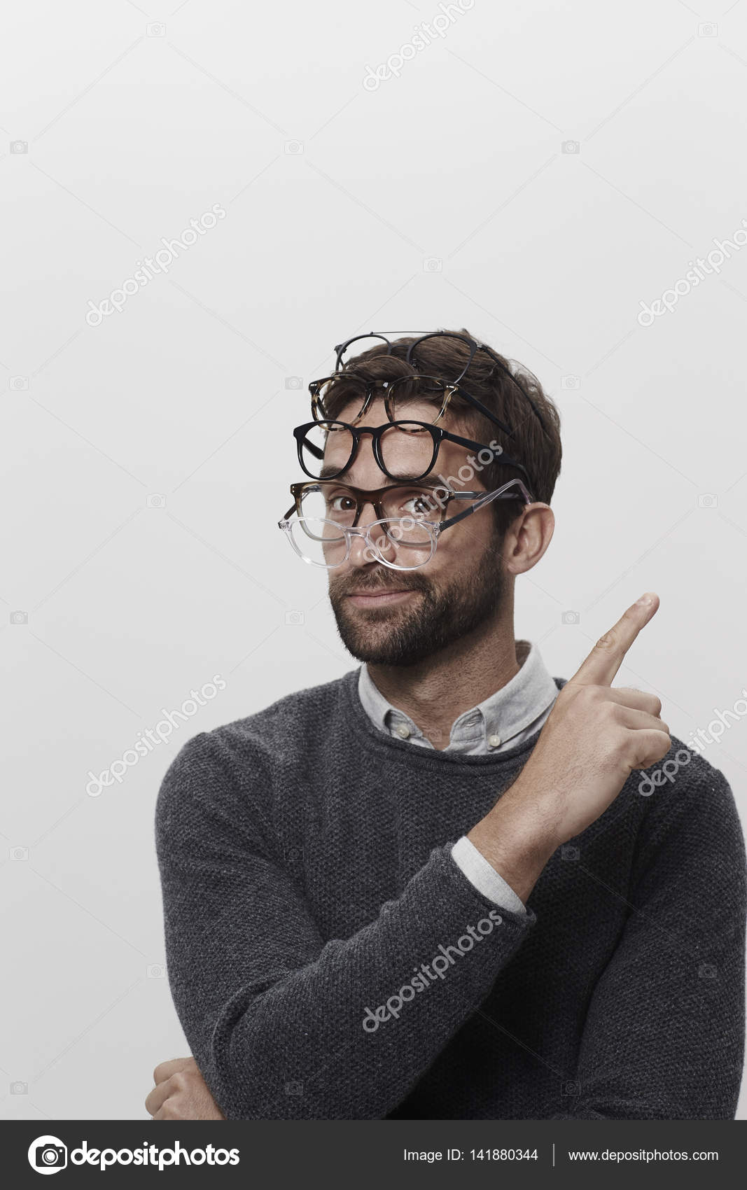 Man wearing many pairs of glasses Stock Photo by ©sanneberg 141880344