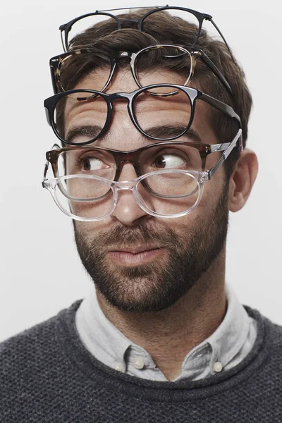 Handsome man with various glasses — Stock Photo, Image