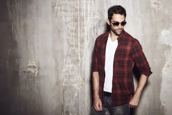 Serious man in checkered shirt — Stock Photo, Image