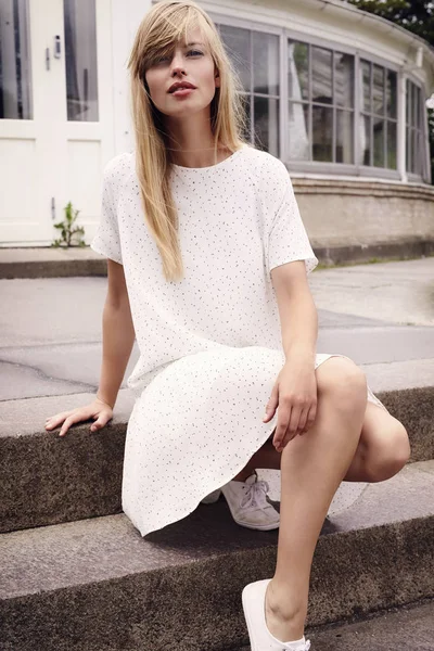 Beautiful woman on steps