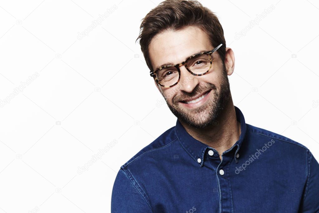 Smiling guy in blue shirt 
