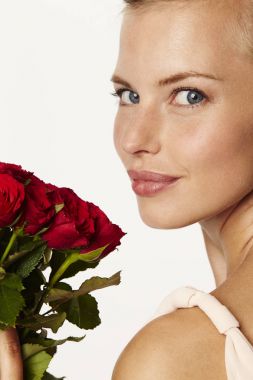 Beautiful woman with red roses clipart