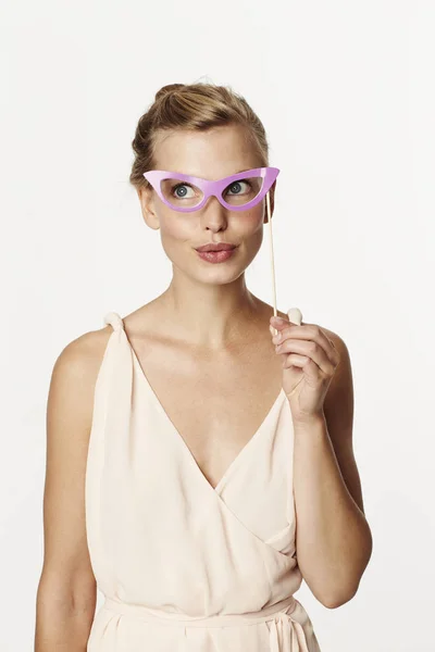 Joke spectacles on woman — Stock Photo, Image