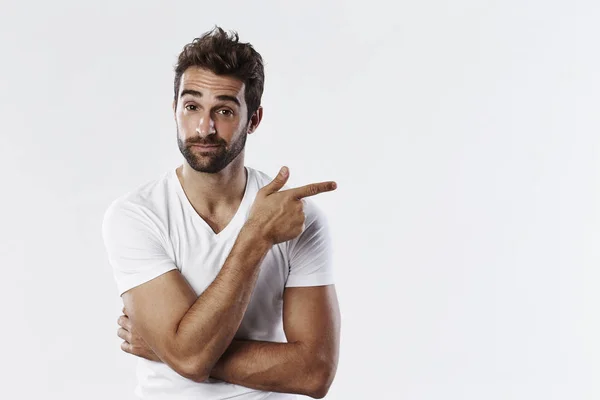 Handsome bearded man pointing — Stock Photo, Image