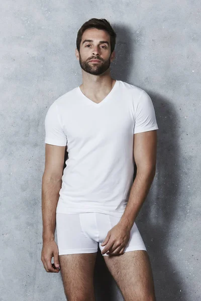 Man in white t-shirt and underpants — Stock Photo, Image