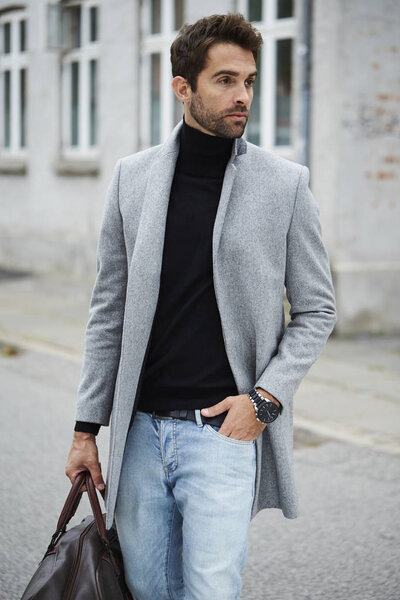 Handsome man in grey overcoat