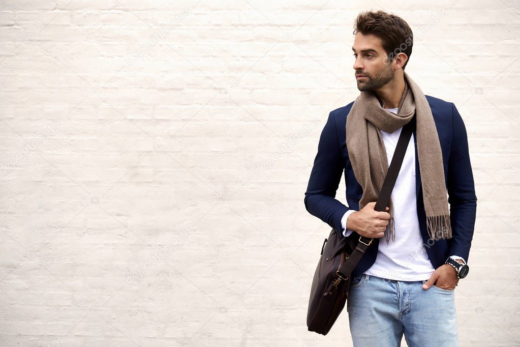 Handsome man in scarf and jacket