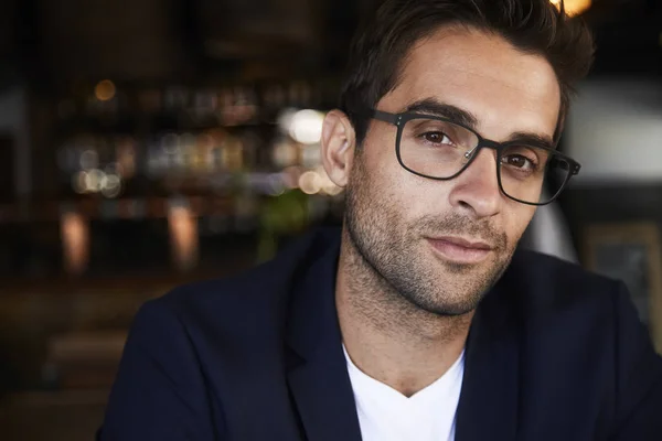 Handsome man with stubble and glasses
