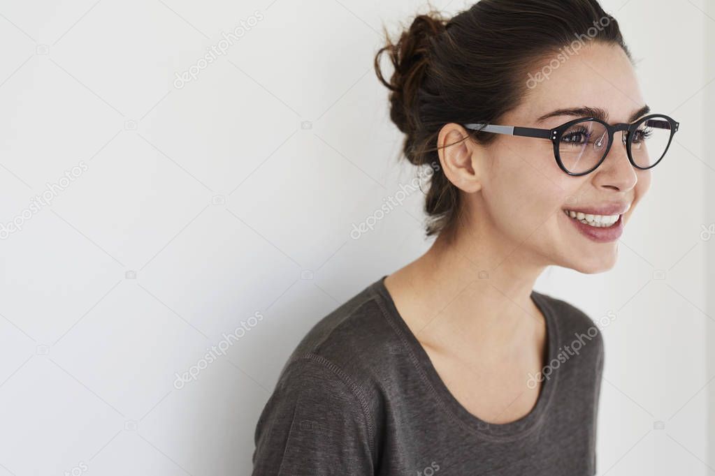 Smiling girl in glasses