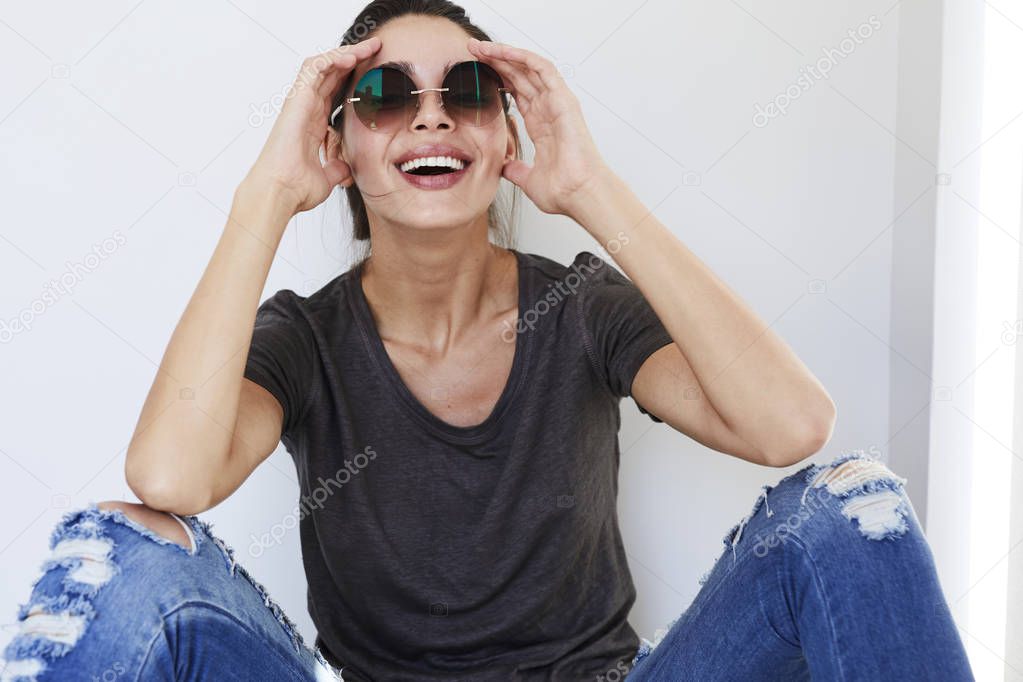 Laughing girl in shades