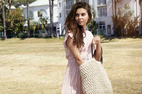 Woman searching in bag — Stock Photo, Image