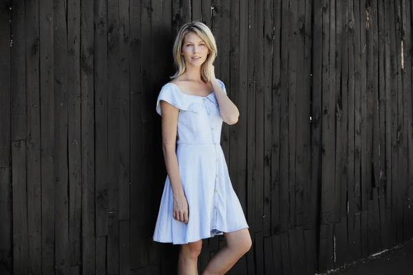 Beautiful woman in blue dress — Stock Photo, Image