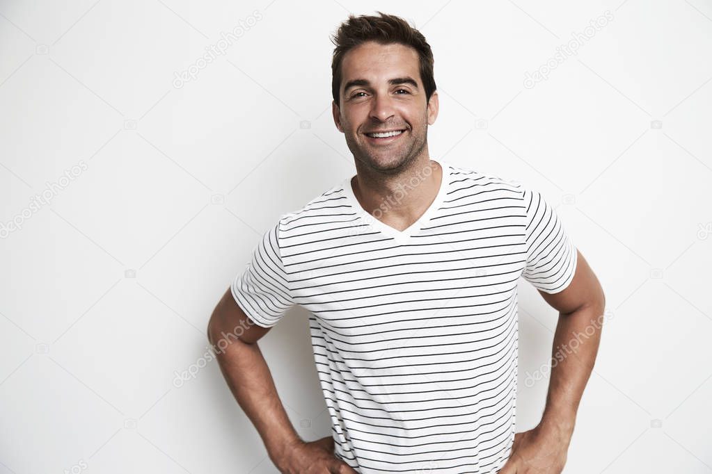 Happy adult man posing for camera 