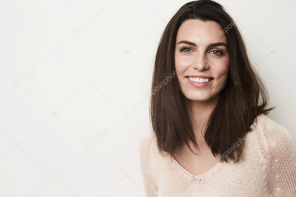 Young brunette with beautiful smile