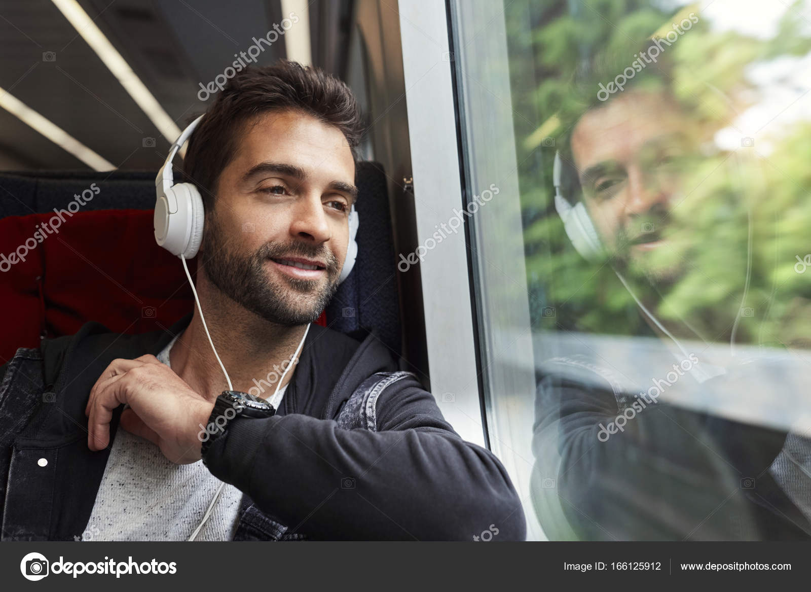 photo Guy With Headphones Stock Photo https depositphotos com 166125912 stock photo happy guy listening to headphones html
