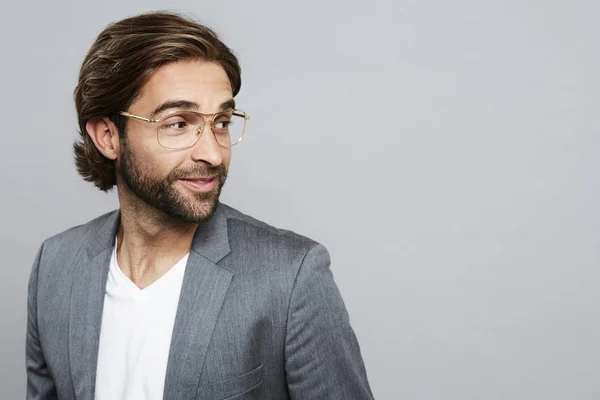 Guy with beard in grey suit jacket — Stock Photo, Image