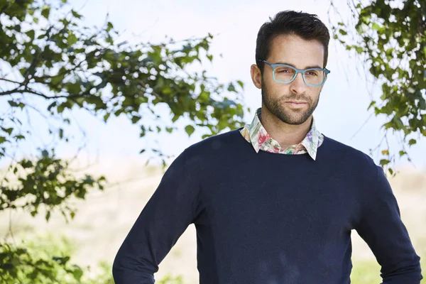 Serious guy in glasses and sweater — Stock Photo, Image