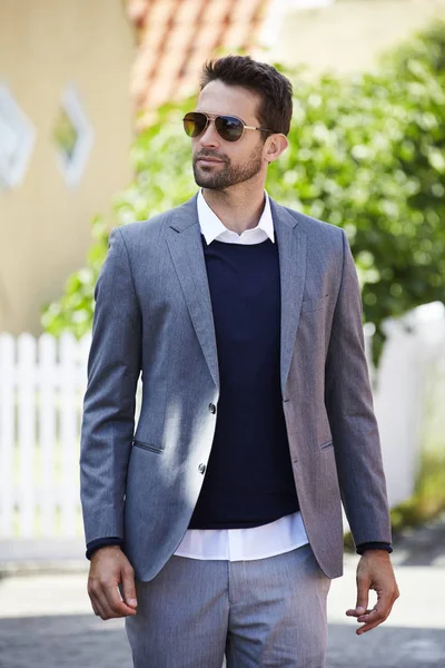 Handsome man wearing grey suit — Stock Photo, Image