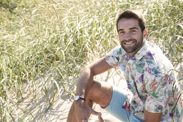Happy man in grass — Stock Photo, Image