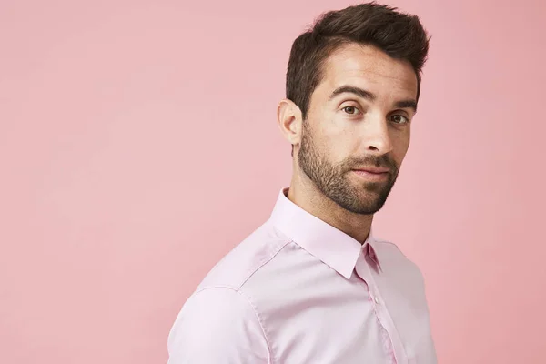 Handsome dude thinking in pink — Stock Photo, Image