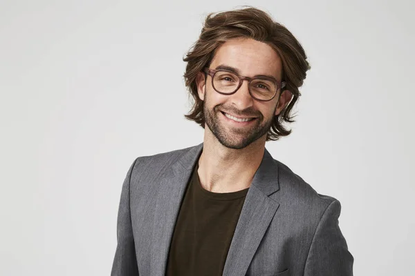 Happy guy in grey suit jacket — Stock Photo, Image