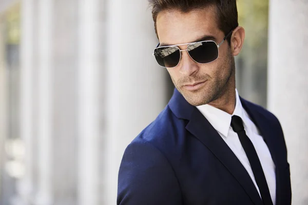 Sharp businessman in sunglasses — Stock Photo, Image