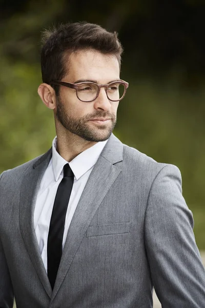 Serious businessman wearing glasses — Stock Photo, Image