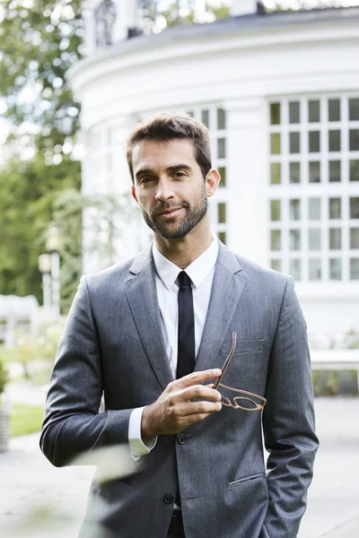 Handsome guy in grey suit — Stock Photo, Image