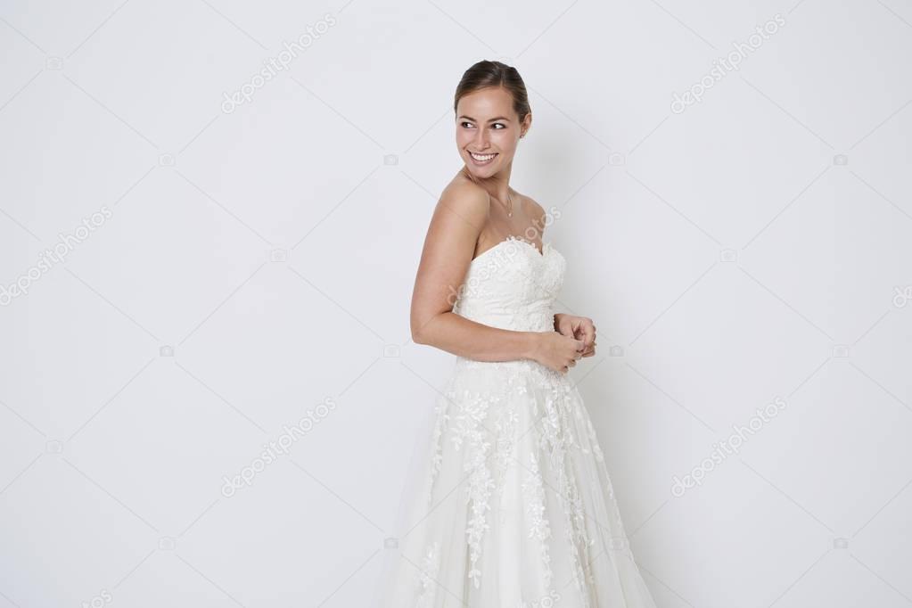 Bride looking over shoulder