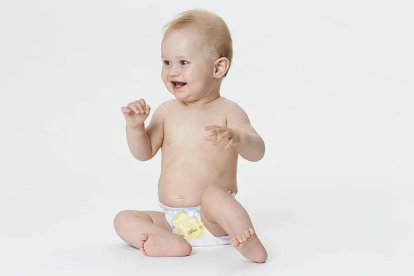 Happy little boy in diaper — Stock Photo, Image