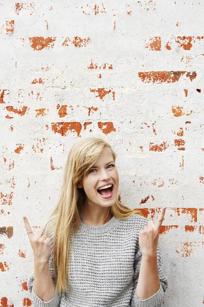 Blond woman pointing up — Stock Photo, Image