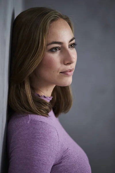 Thoughtful Young Woman Looking Away Leaning Wall — Stock Photo, Image