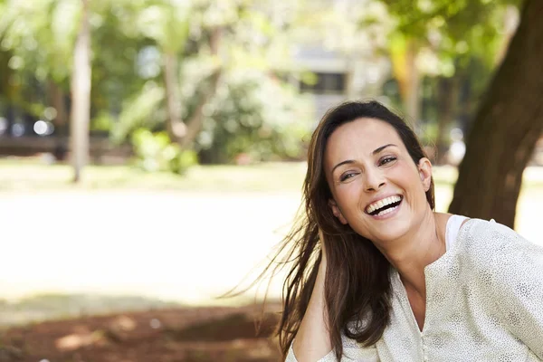 Carefree Mid Adult Brunette Woman Laughing Park — Stock Photo, Image