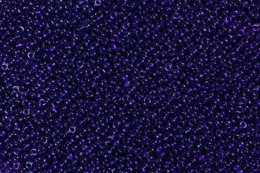 Koyu mavi cam parlak boncuk.