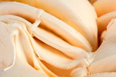 Turuncu krem şanti yakın çekim.