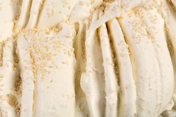 Vanilla ice-cream with nuts full of taste. — Stock Photo, Image