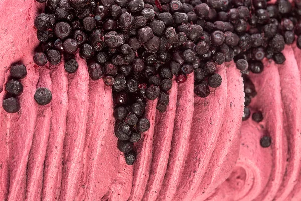 Textura de sorvete cremoso com mirtilos . — Fotografia de Stock