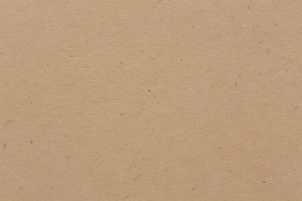 Papel de embrulho fundo de papelão bege . — Fotografia de Stock