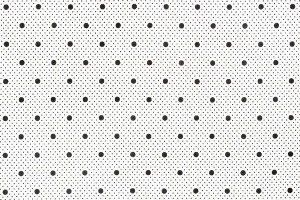 Weißer Stoff mit schwarzen Punkten als Hintergrund. — Stockfoto