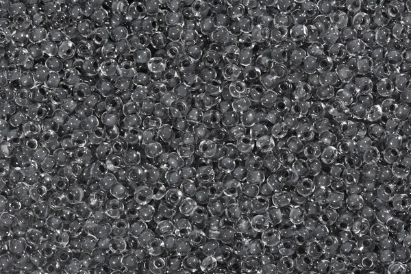 Cinza escuro contas de sementes de vidro fundo . — Fotografia de Stock