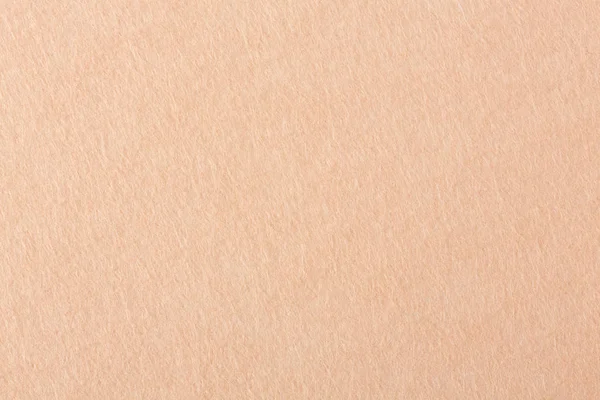 Yumuşak kahverengi keçe dokulu arka plan.