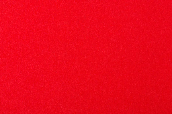Textura de feltro vermelho na macro . — Fotografia de Stock